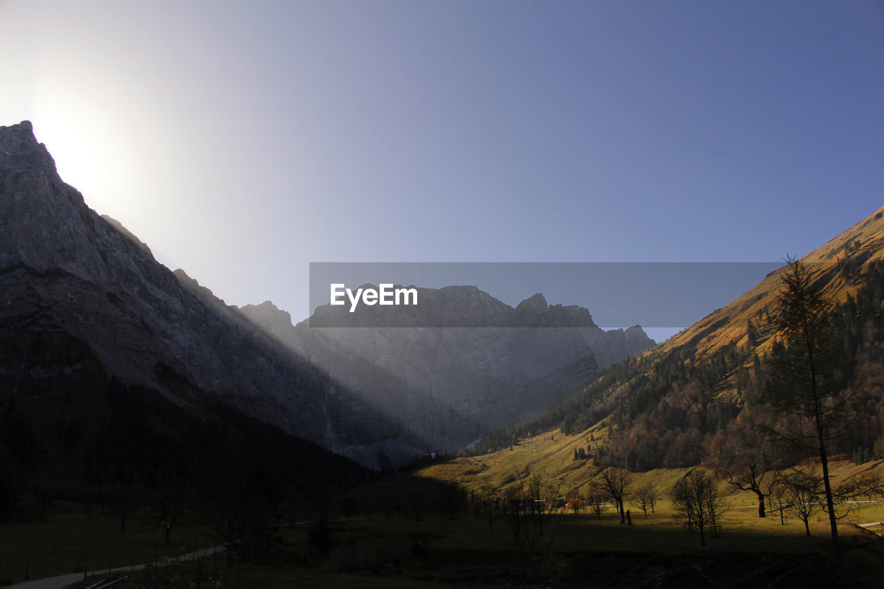 Scenic view of mountains against clear sky