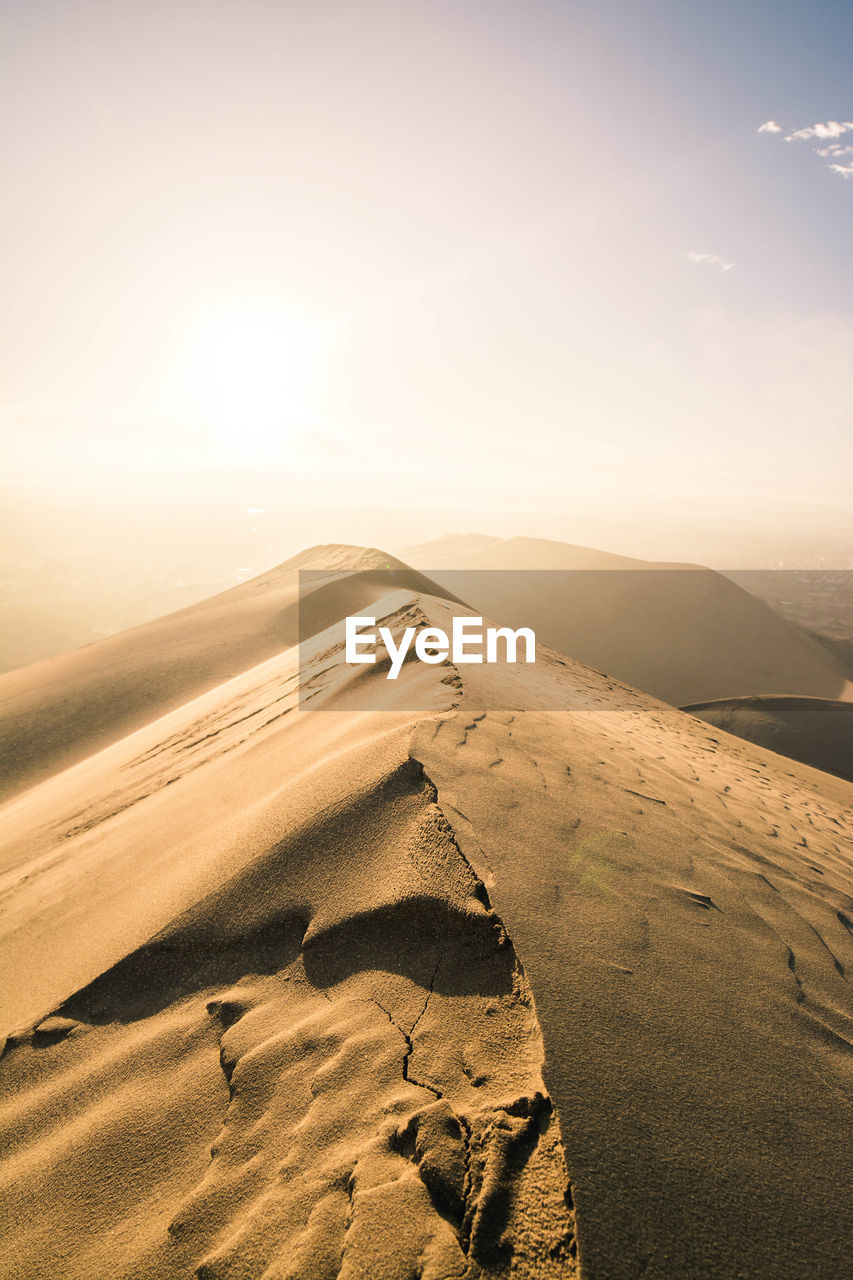 Scenic view of desert against sky