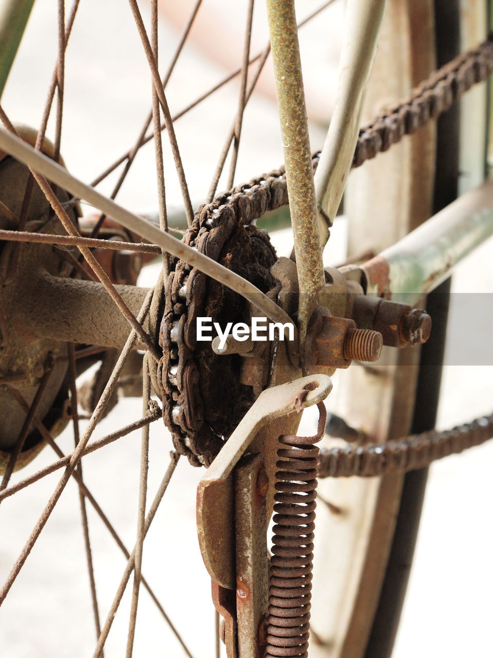 Close-up of old rusty metallic chain on bicycle