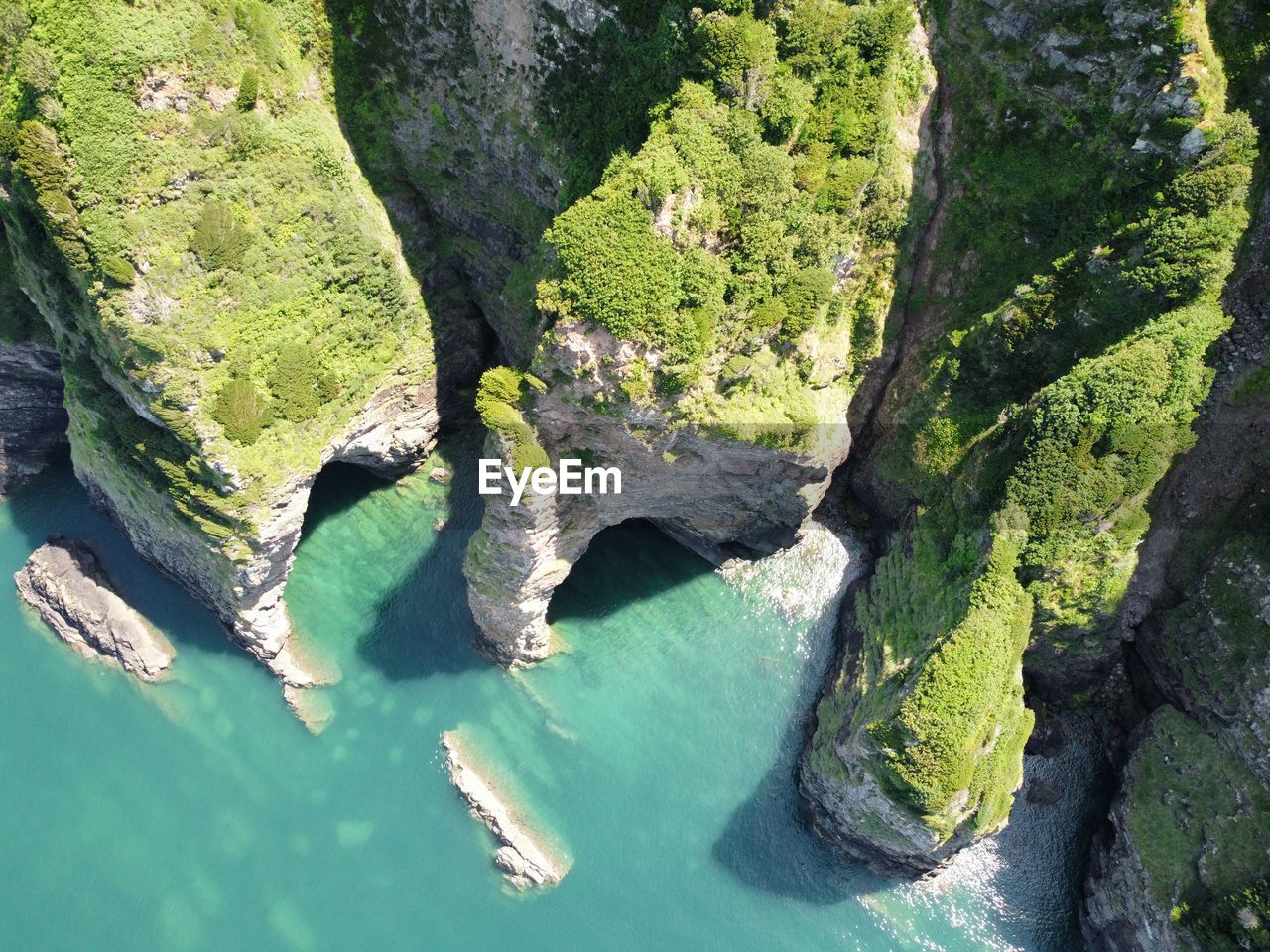 High angle view of rock formation in sea