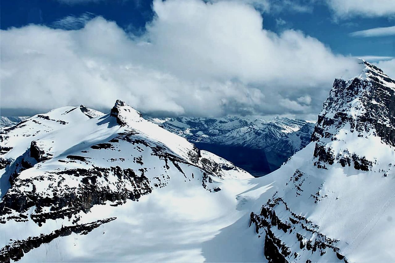 SNOWCAPPED MOUNTAINS AGAINST SKY