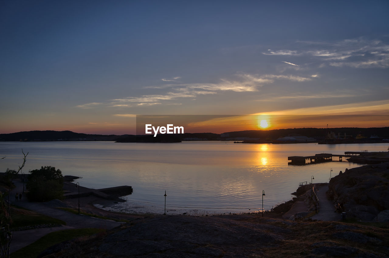 Scenic view of sea against sky during sunset