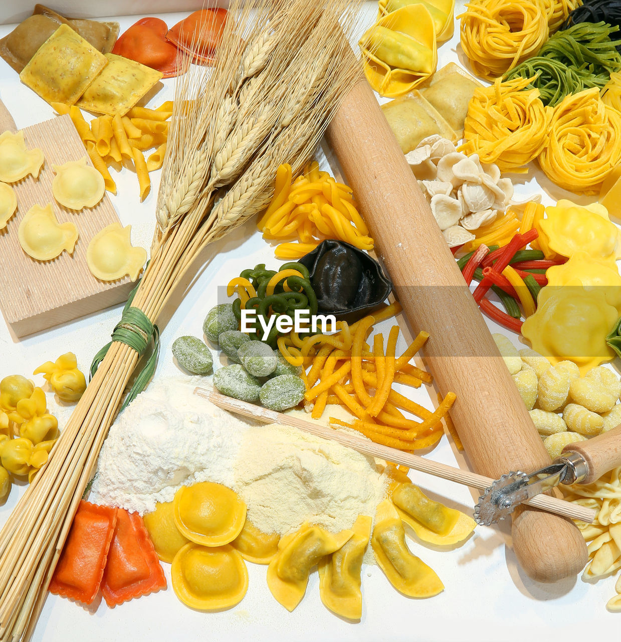 Italian homemade pasta with various sizes called tagliatelle tortellini ravioli