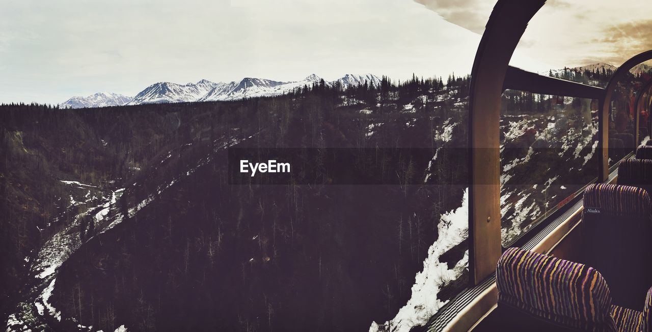 Mountains during winter seen from ski lift