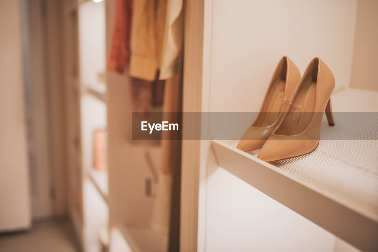 Close-up of shoes on rack