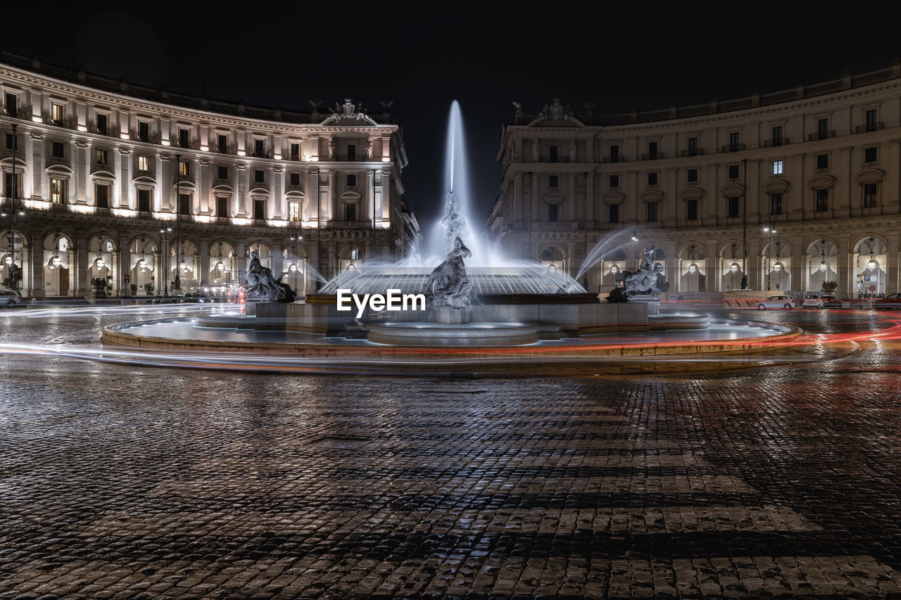 The majestic fountain of the naiads photographed at night with a long exposure.