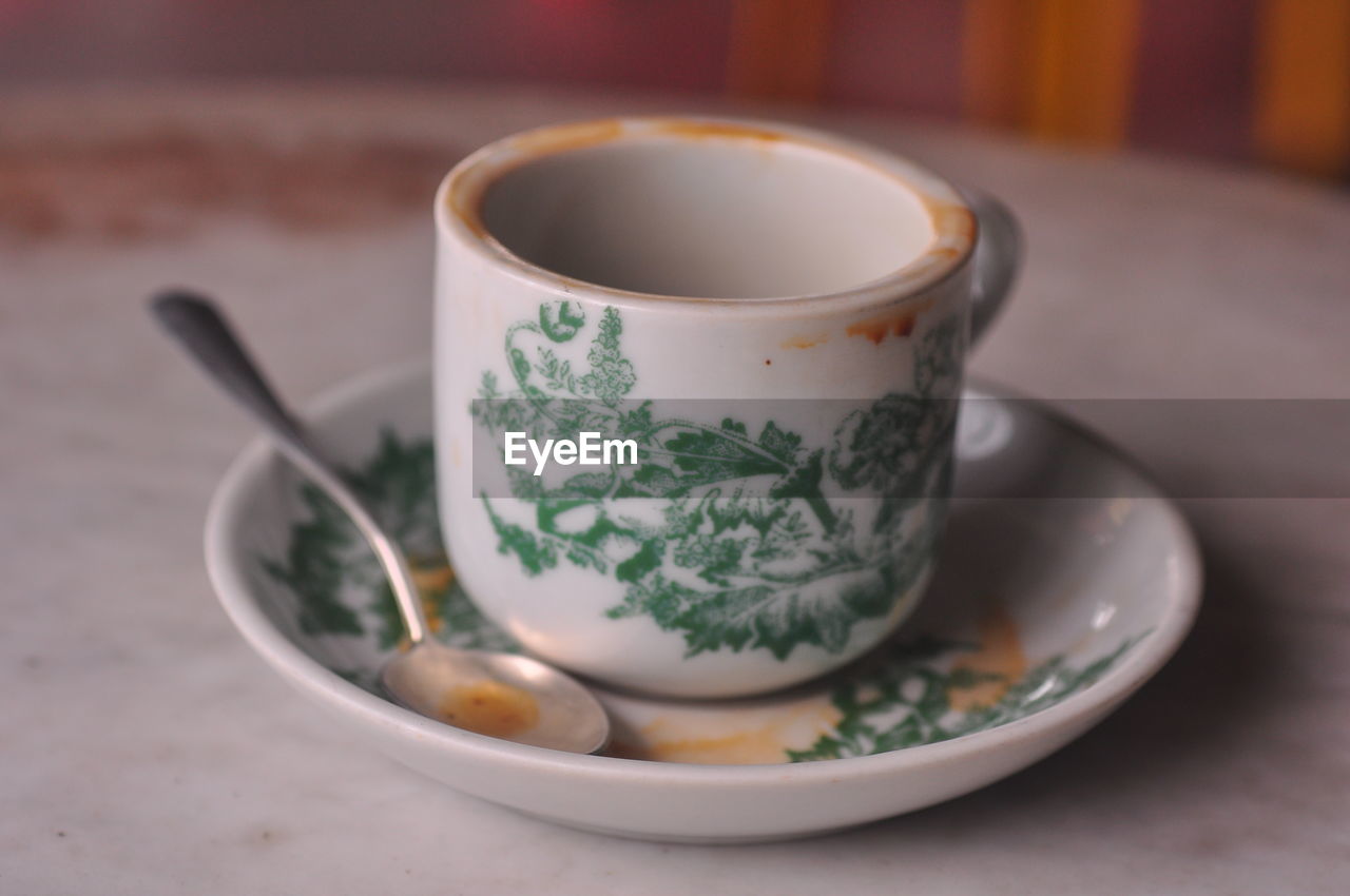 Close-up of tea cup on table