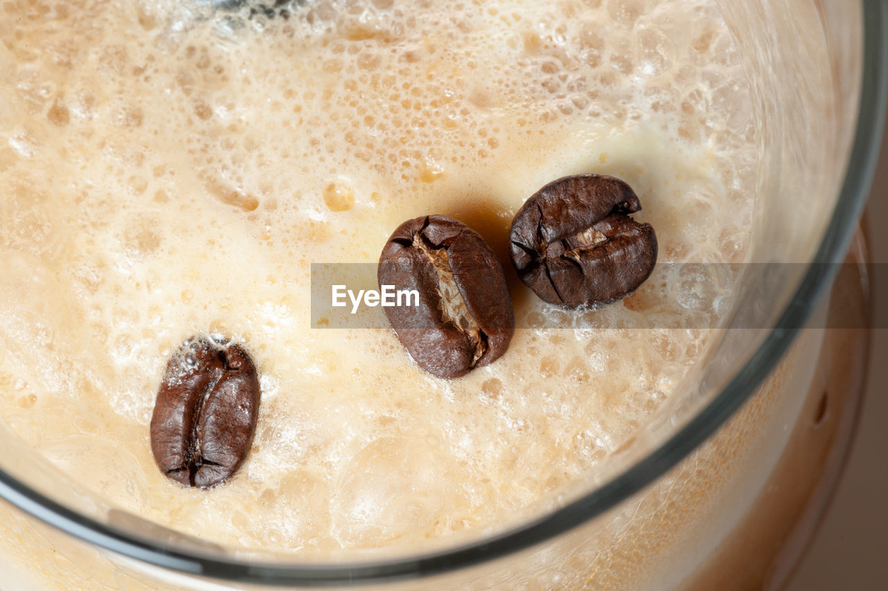 Coffee seeds on cream