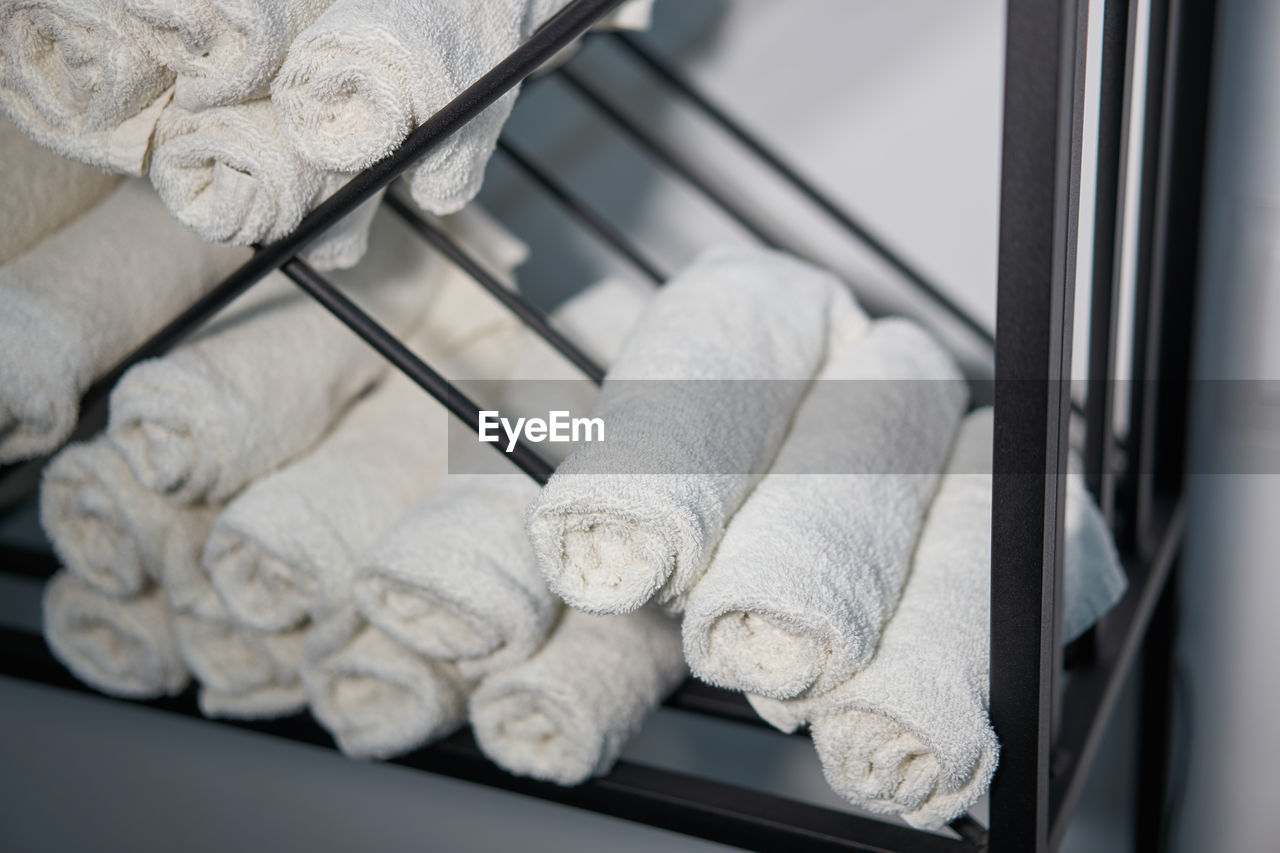 Close-up of towels on rack