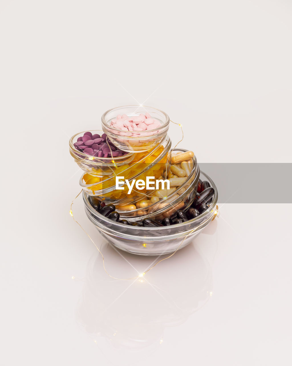 High angle view of jar on table against white background