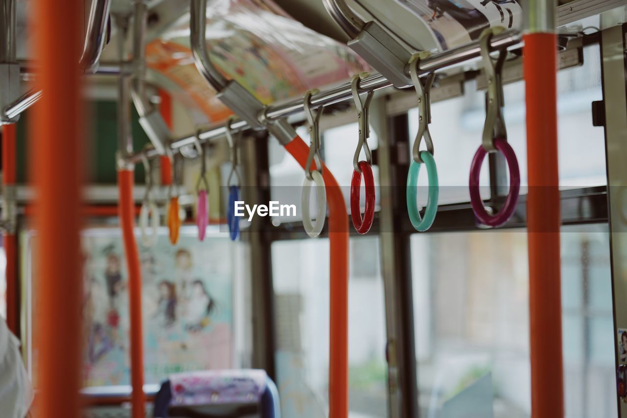 Handles hanging in bus