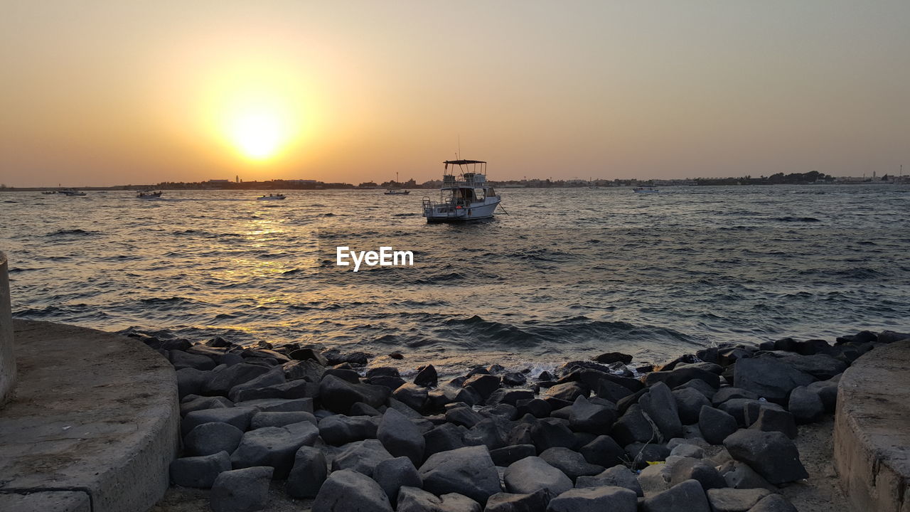 Scenic view of sea against sky during sunset