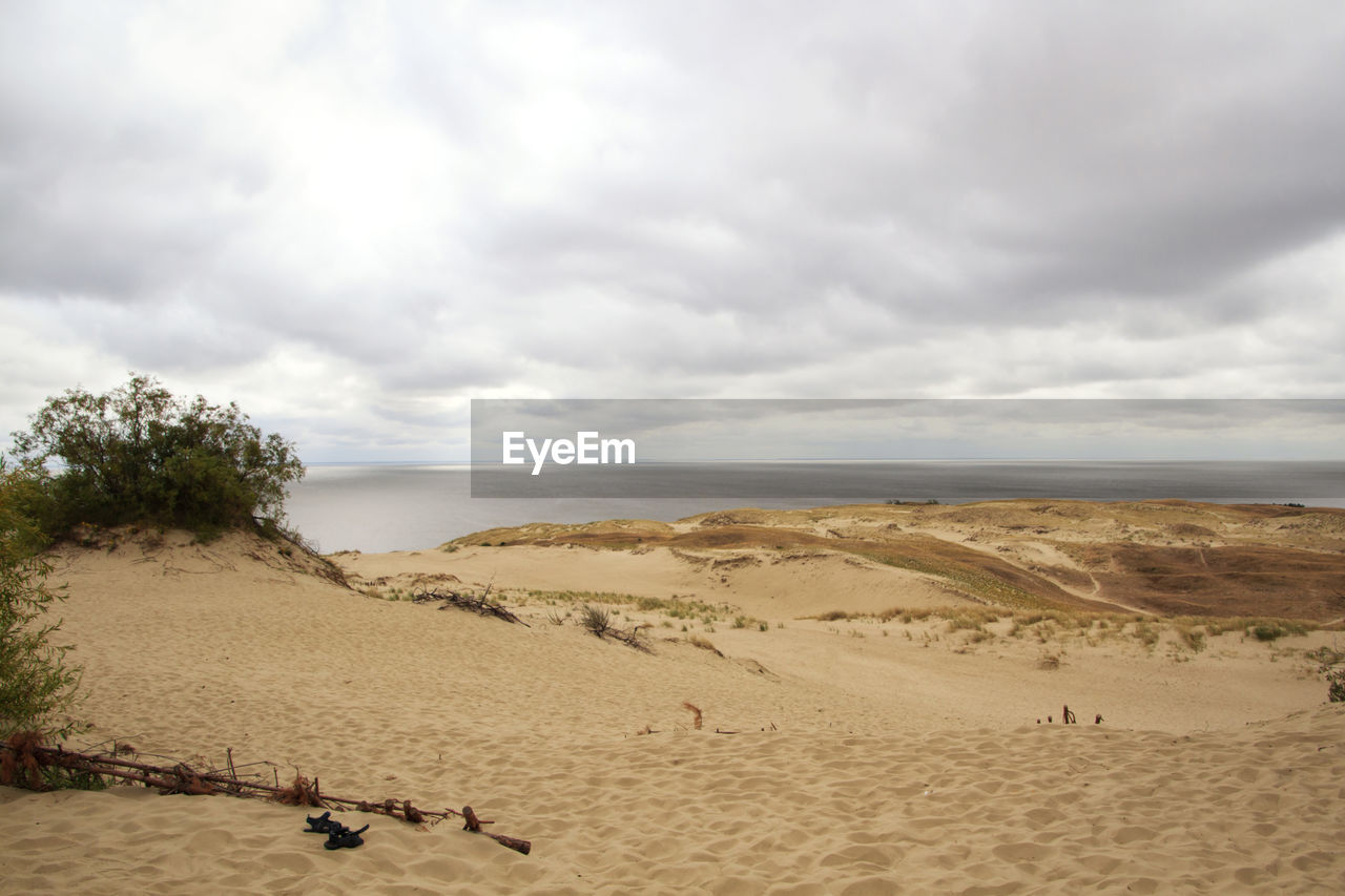 Scenic view of beach against sky