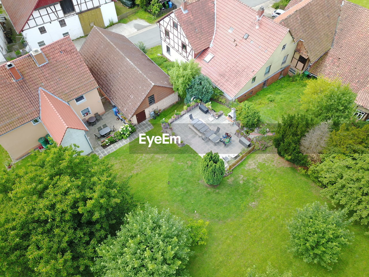 High angle view of houses and buildings in city