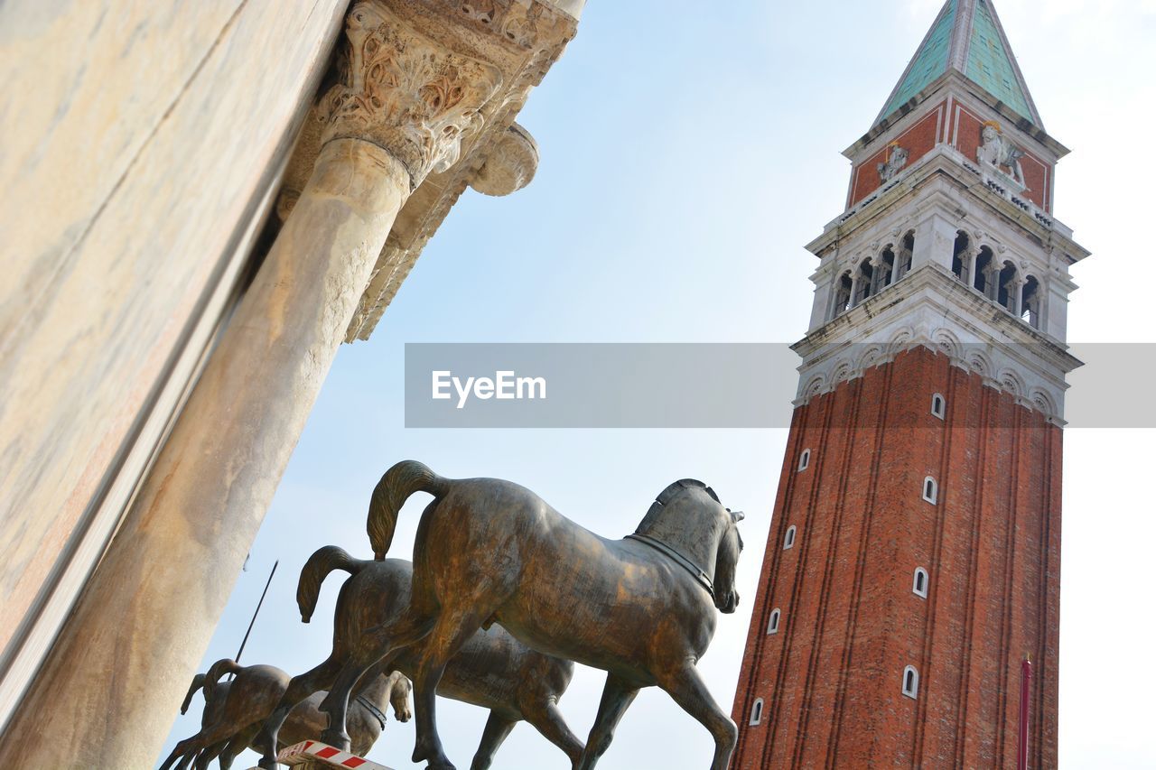 LOW ANGLE VIEW OF STATUE