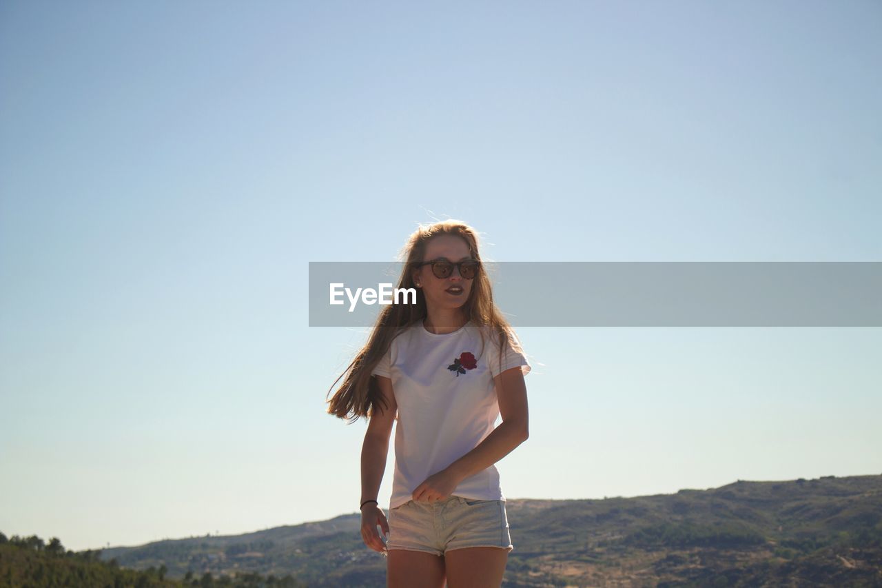 EyeEm Selects Carefree Only Women One Woman Only Freedom Fun Summer Long Hair Enjoyment Adult Young Adult Sunny Redhead Smiling Sunlight People Adults Only Vitality One Person Outdoors Front View Sunset Landscape Sky Nature The Week On EyeEm