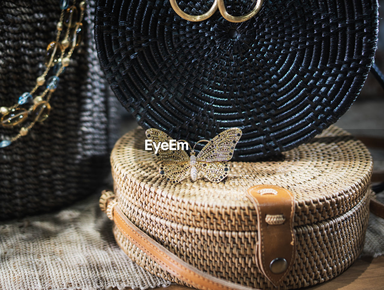 Close-up of wicker containers on table