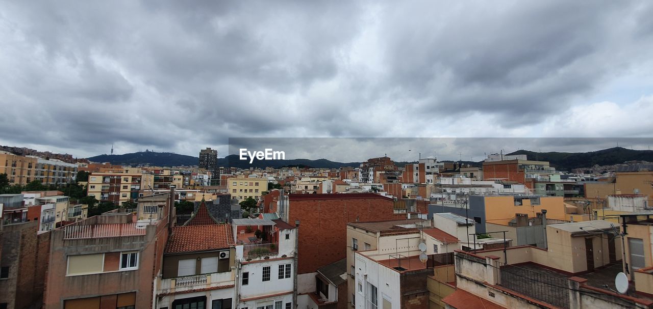 Panoramic view of residential buildings against sky