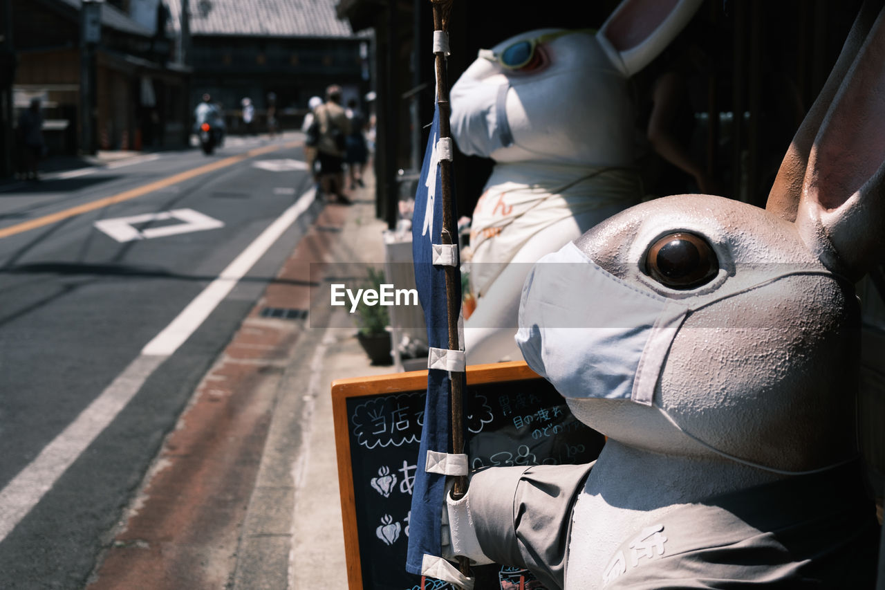 CLOSE-UP OF A ZEBRA CROSSING IN CITY