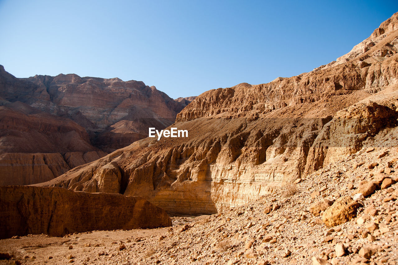 ROCK FORMATIONS AGAINST SKY