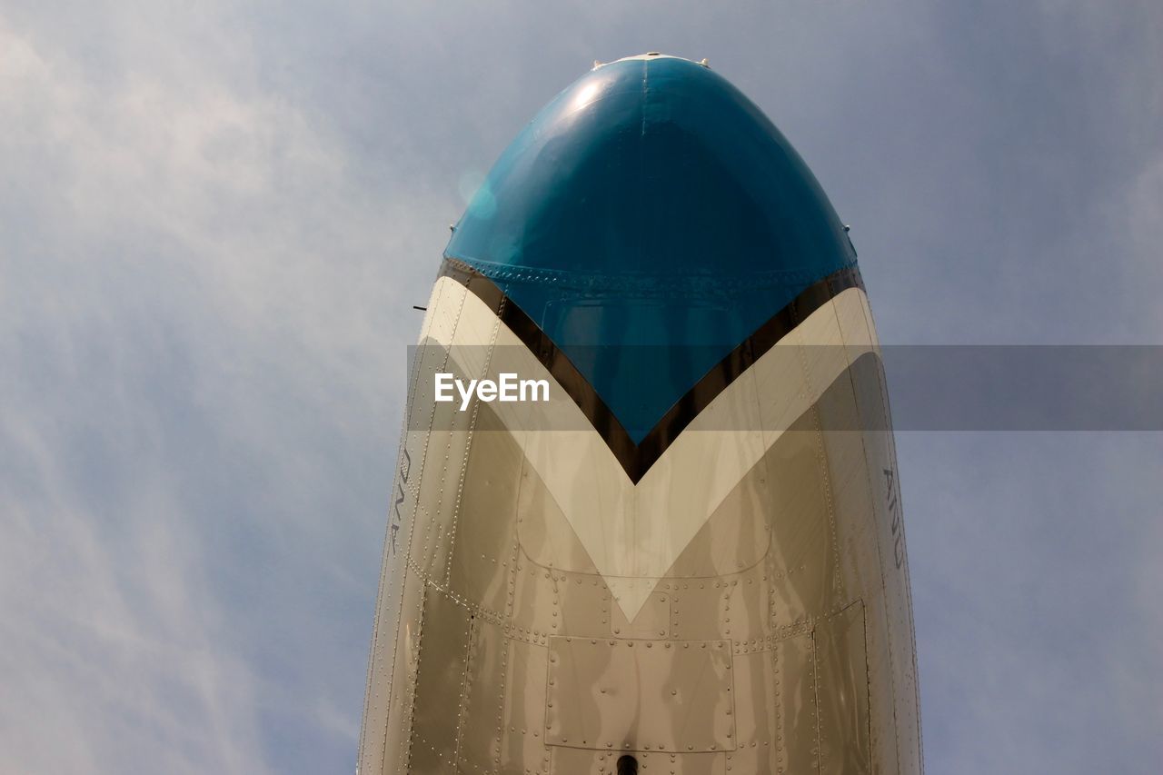 LOW ANGLE VIEW OF TOWER AGAINST BLUE SKY