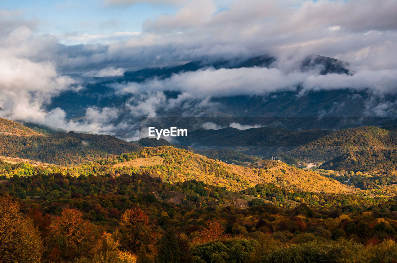 Scenic view of landscape against sky during autumn