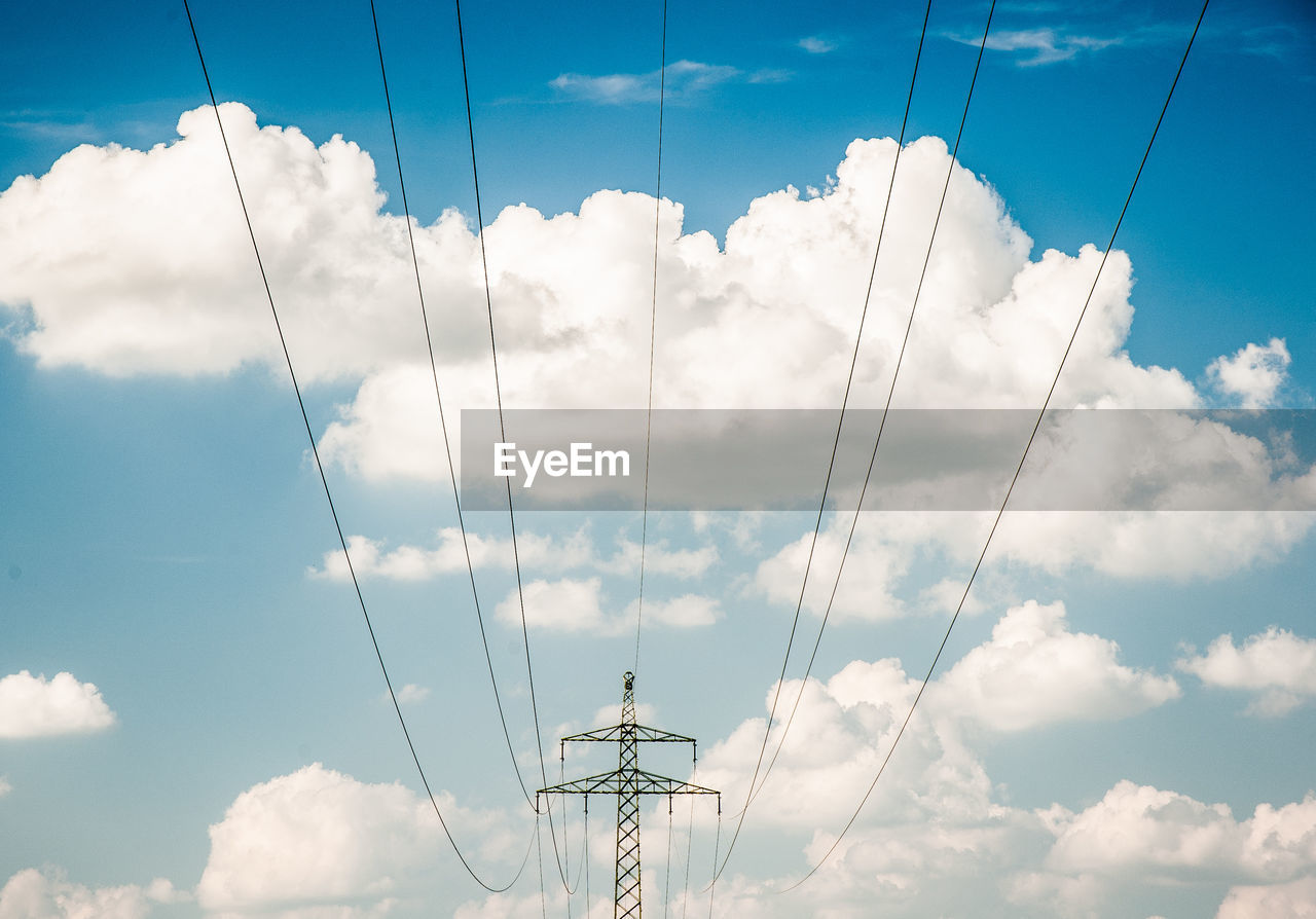 LOW ANGLE VIEW OF ELECTRICITY PYLONS AGAINST SKY