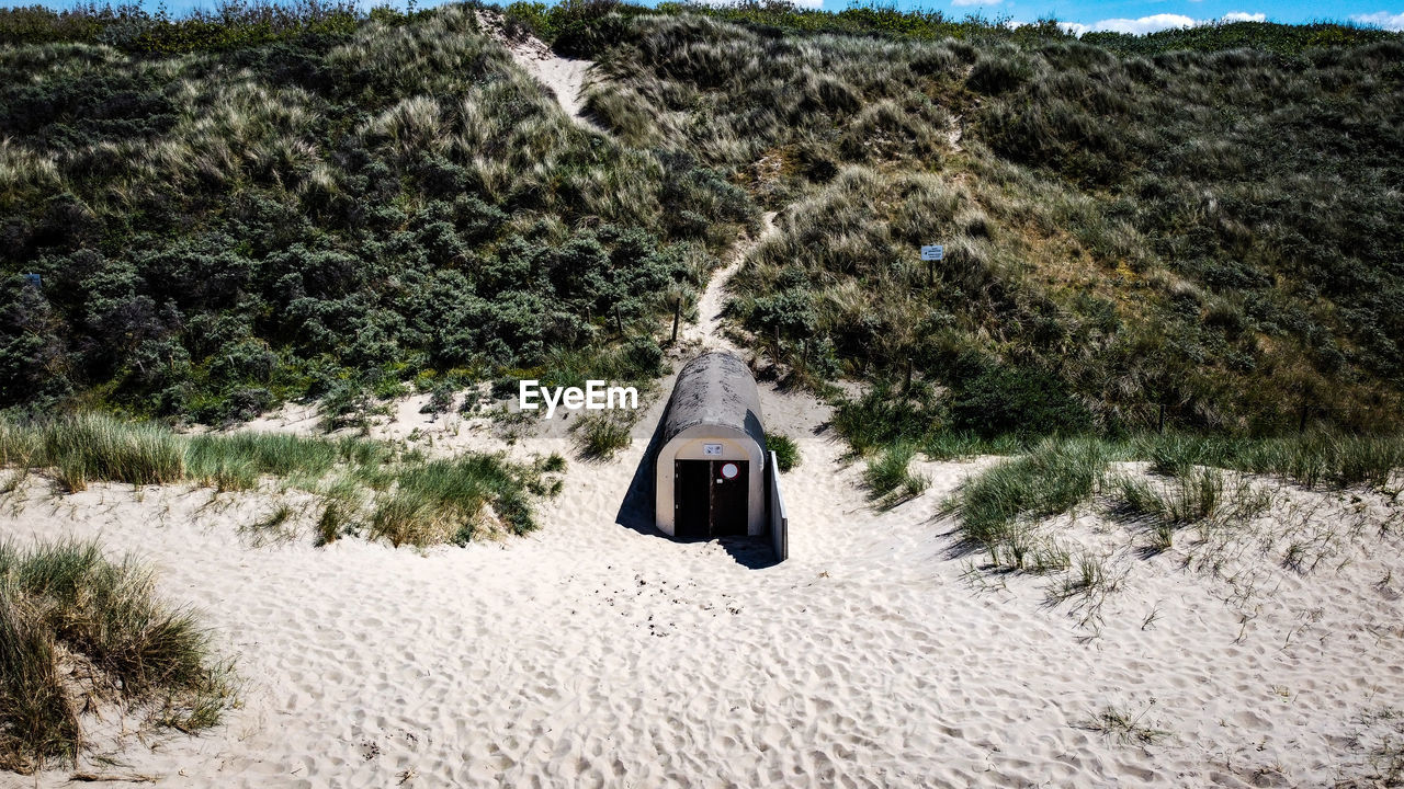 Entrance of a tunnelin the dunes on the belgian coast.