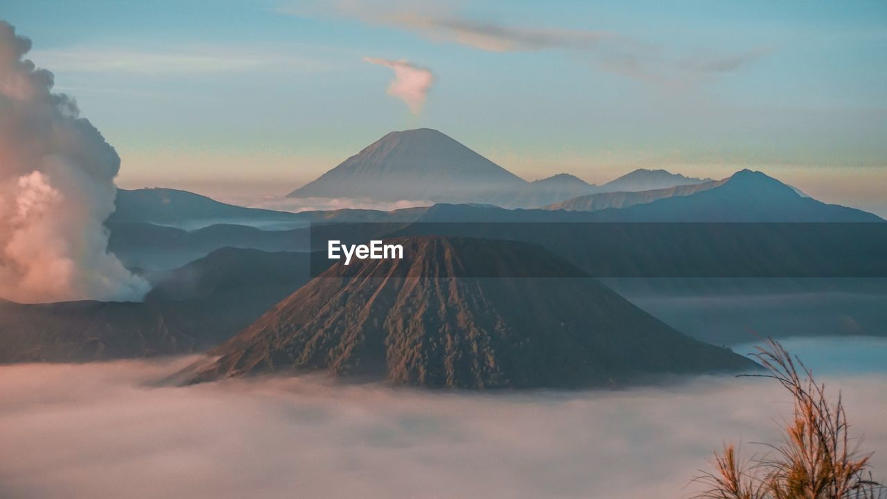 Scenic view of mountains against sky during sunset