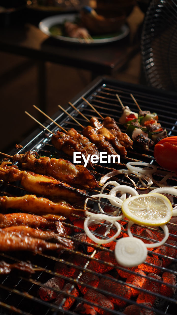 high angle view of food on barbecue grill