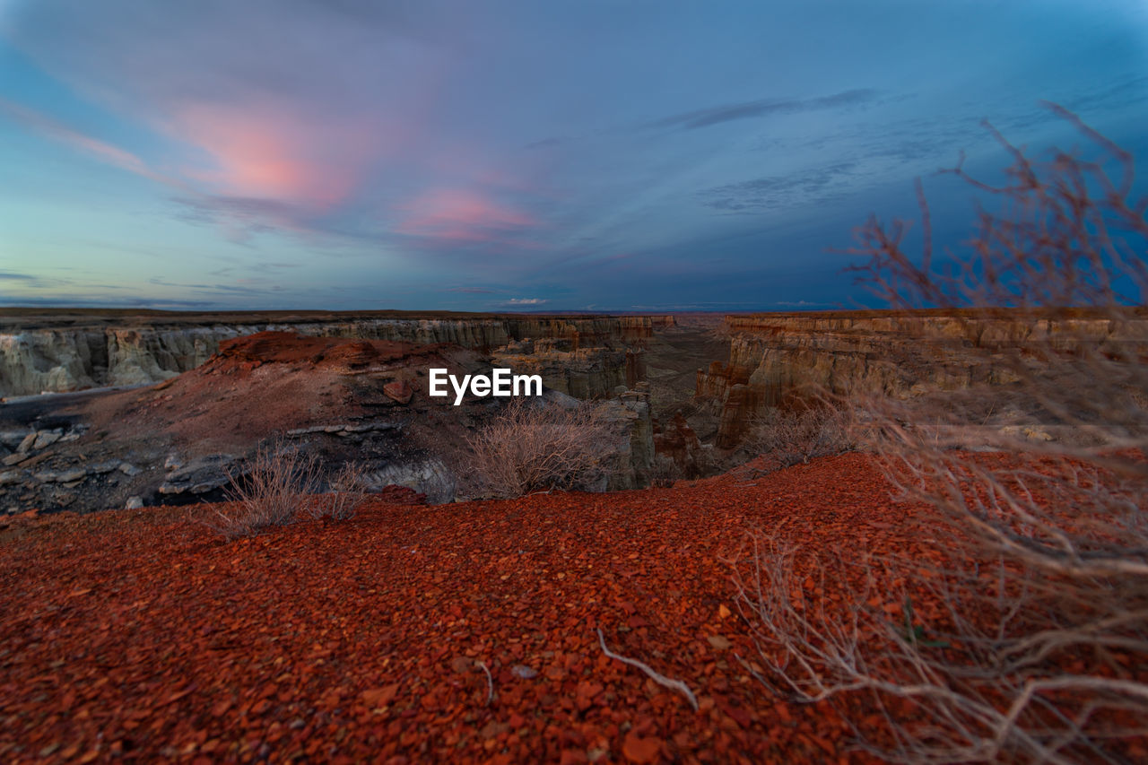 Scenic view of landscape against sky during sunset