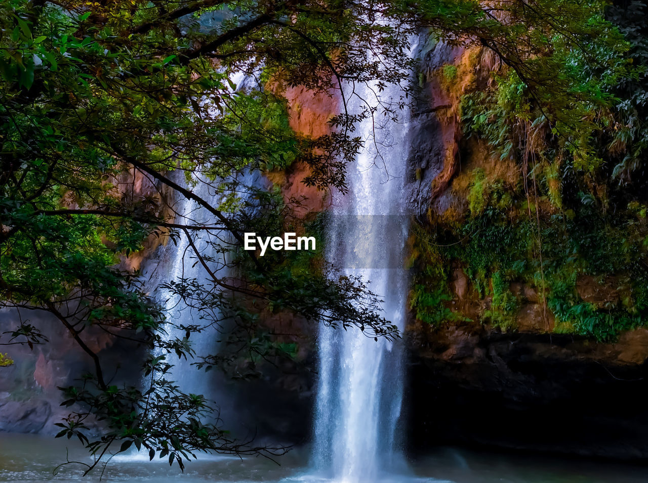 SCENIC VIEW OF WATERFALL