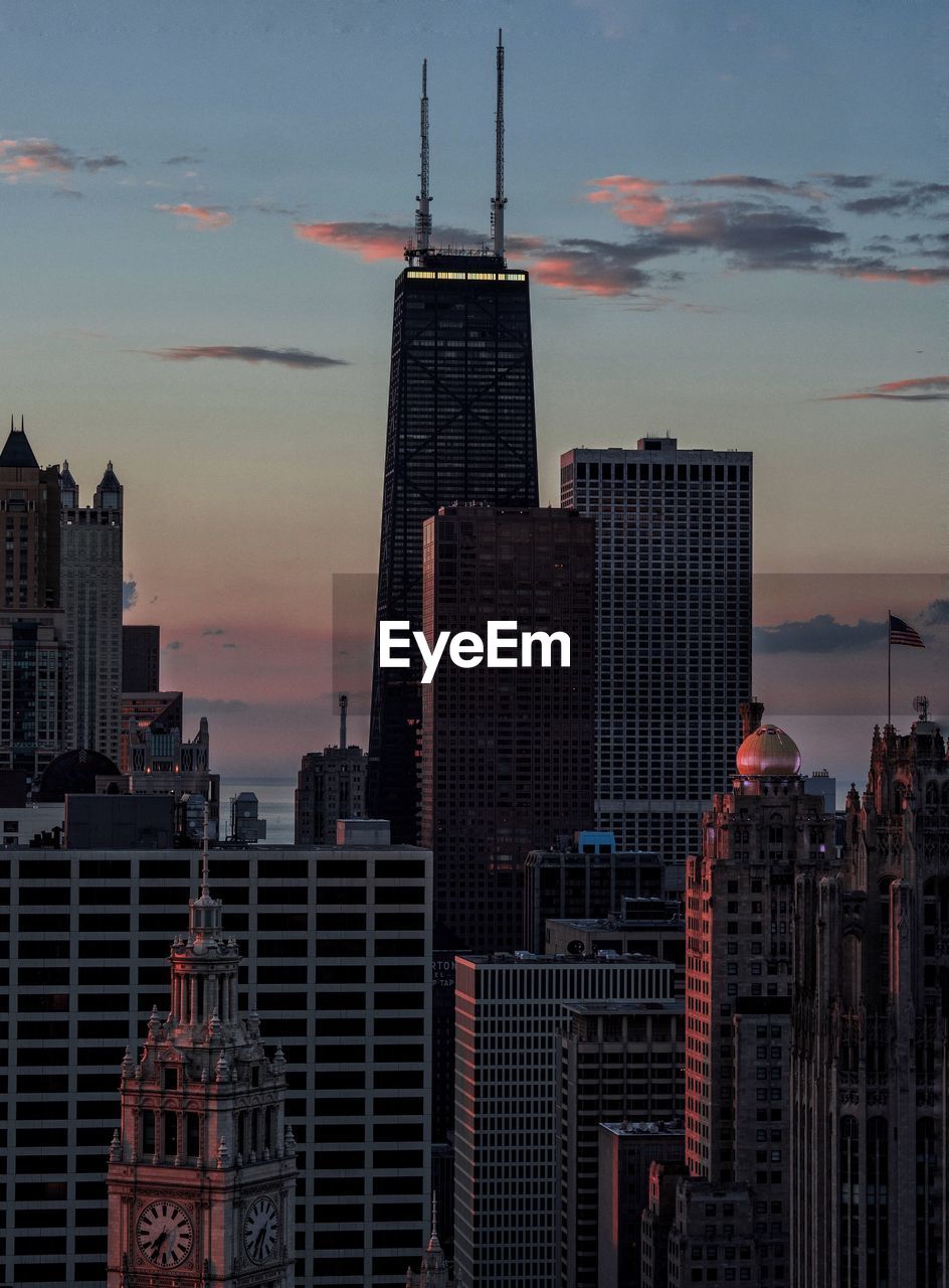 View of skyscrapers at sunset