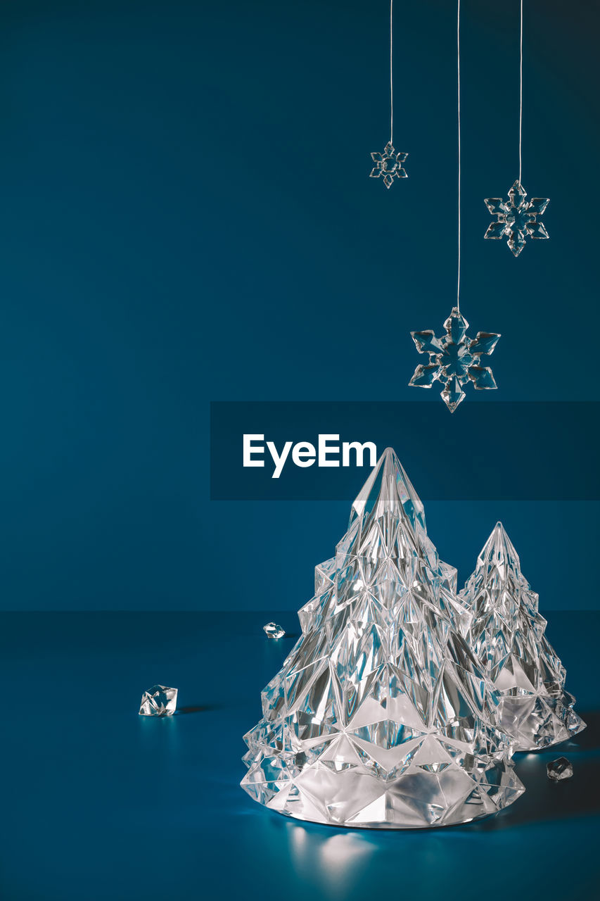 Empty stage with christmas decorations on dark blue background