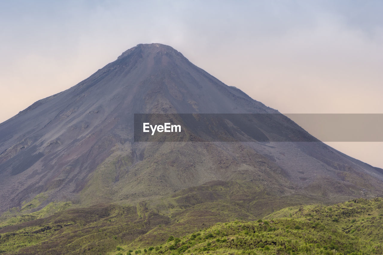 VIEW OF VOLCANIC LANDSCAPE AGAINST SKY