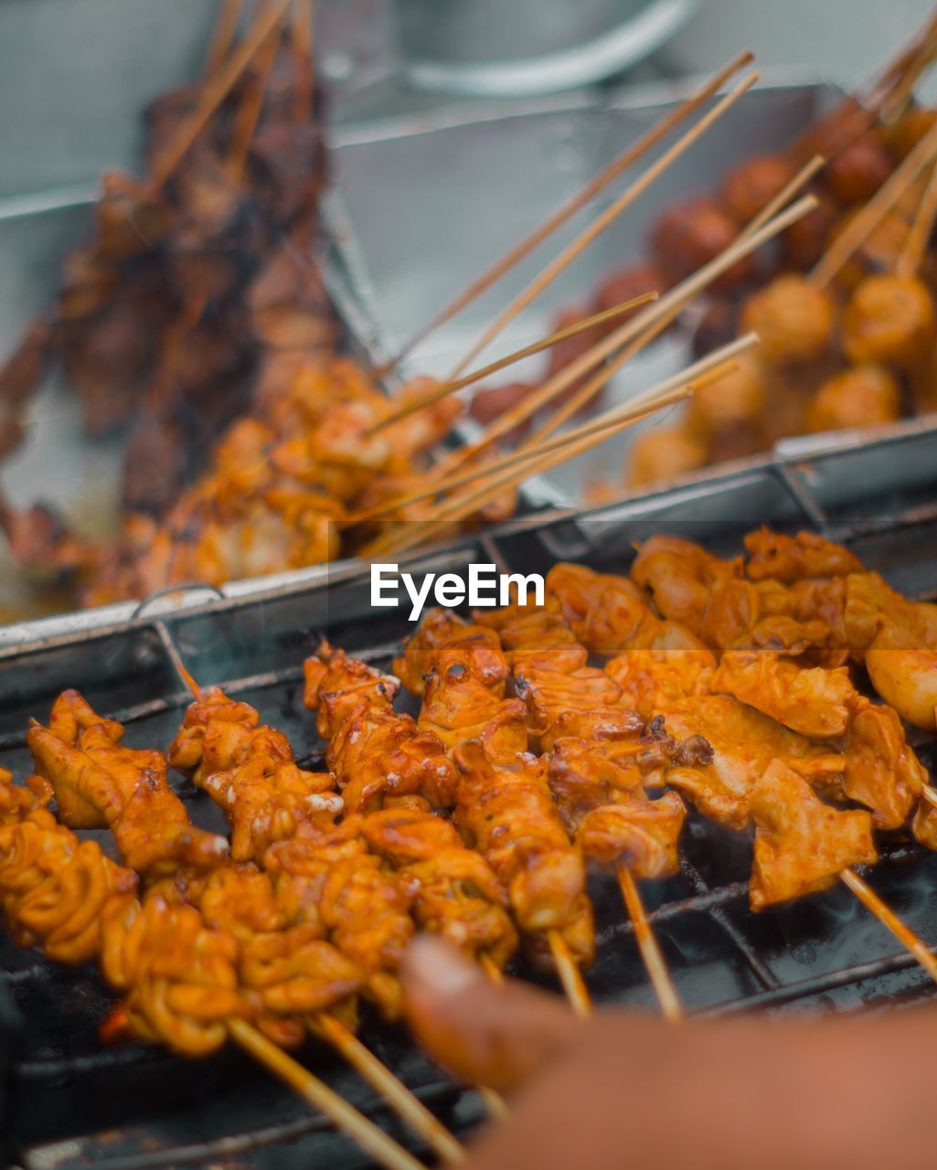 High angle view of meat on barbecue grill