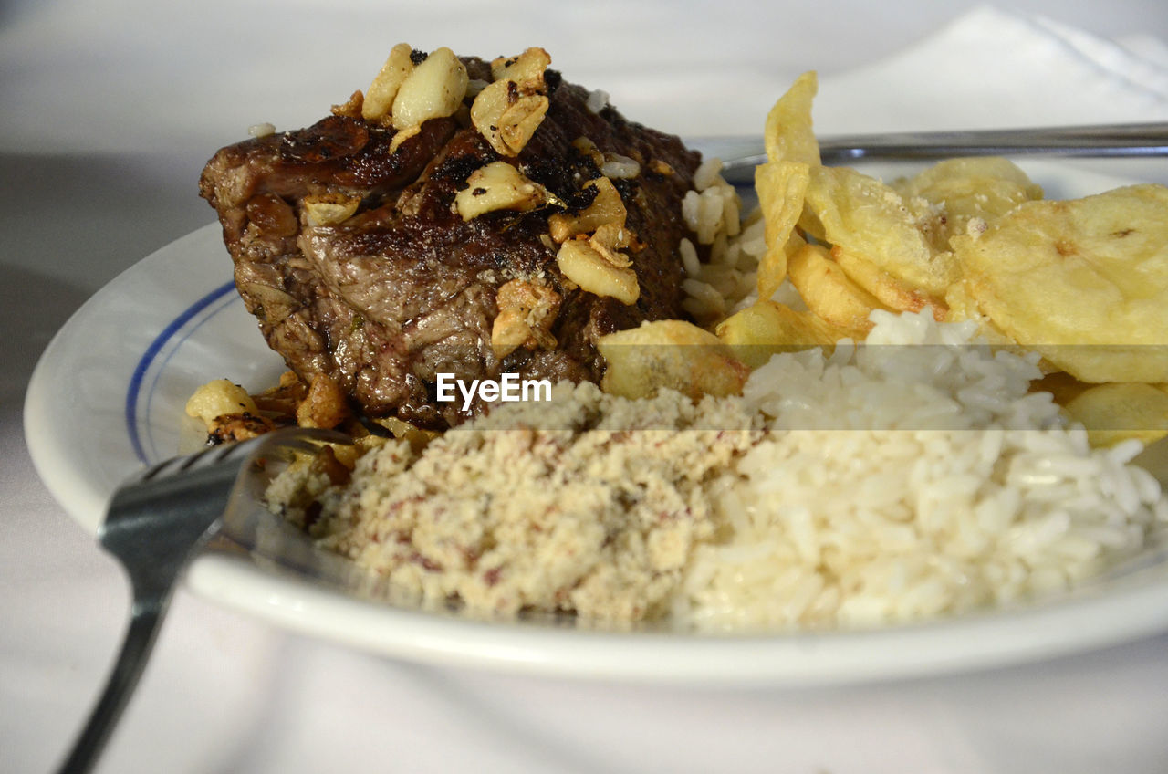 Close-up of fillet aranha served in plate on table