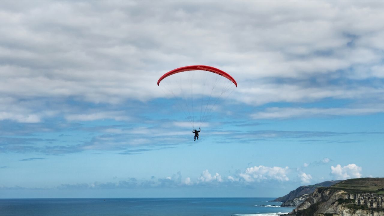 Paraglider over sea