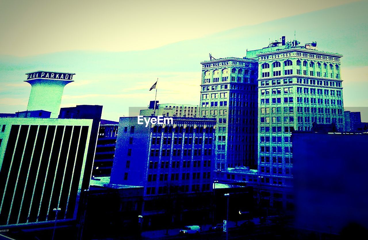 LOW ANGLE VIEW OF BUILDINGS AGAINST SKY