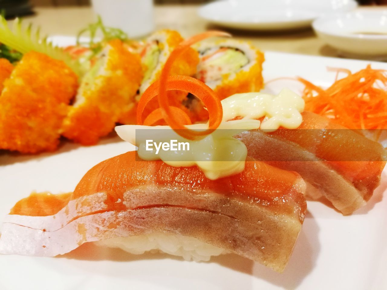 CLOSE-UP OF SUSHI SERVED ON PLATE