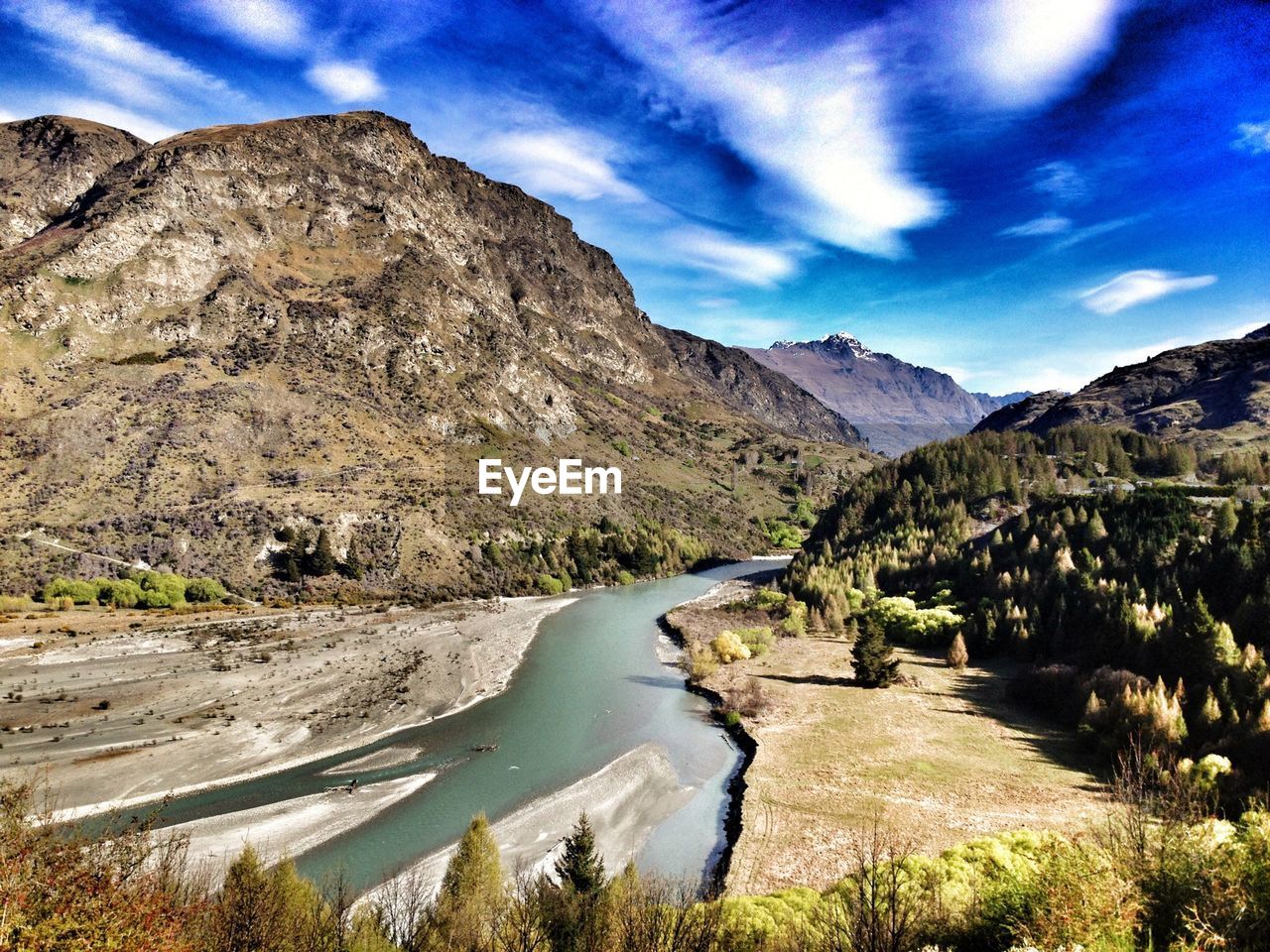 Majestic view of mountains with stream