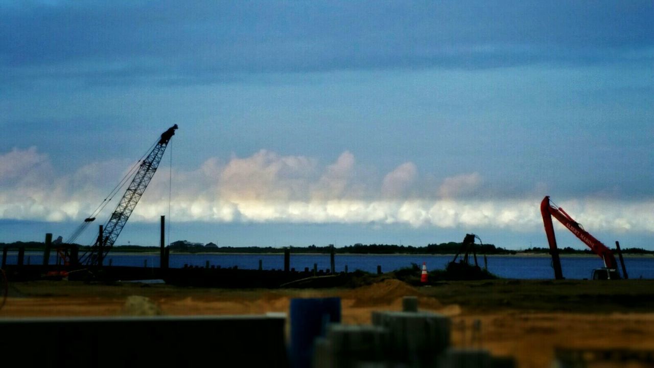 VIEW OF SEA AGAINST CLOUDY SKY