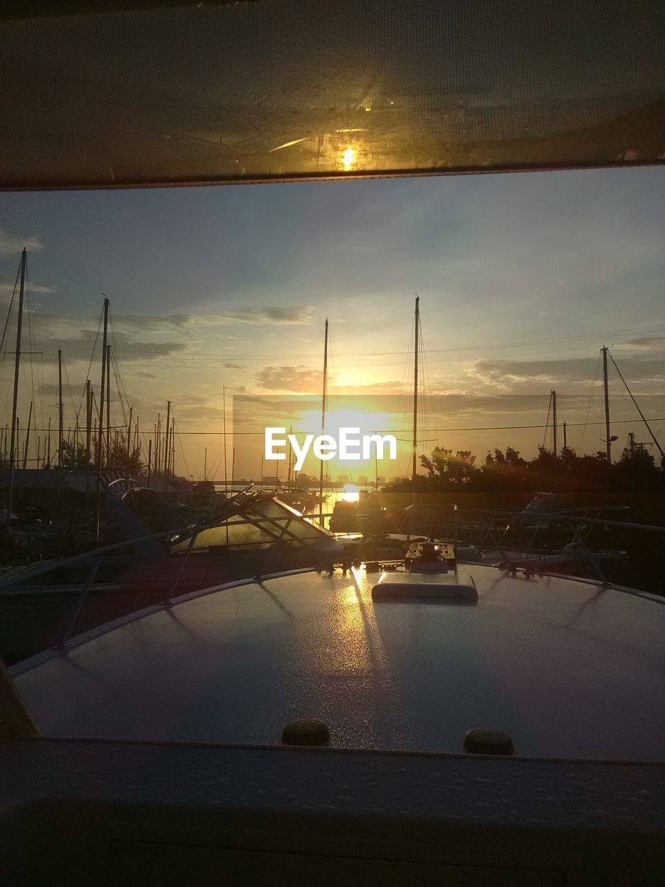 SAILBOATS ON STREET DURING SUNSET