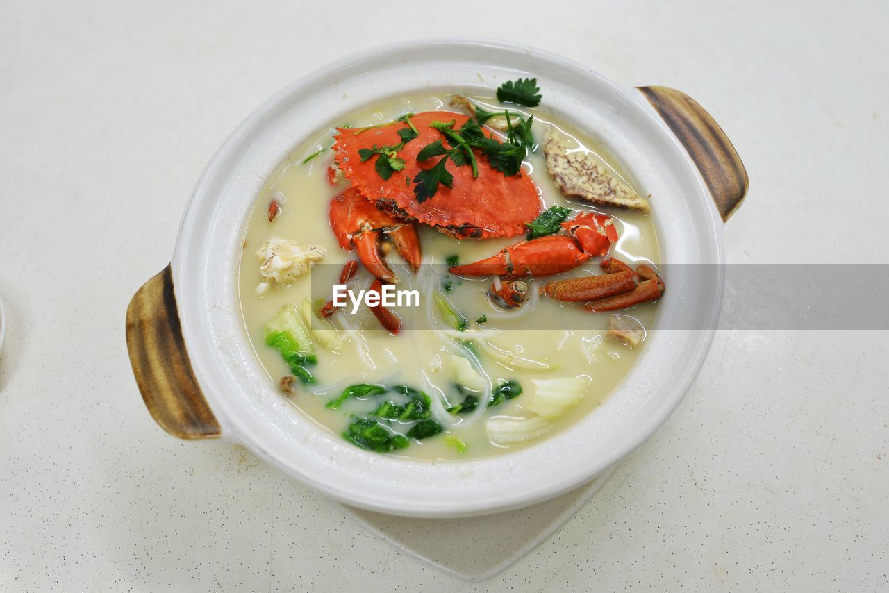 High angle view of crab bee hoon in container