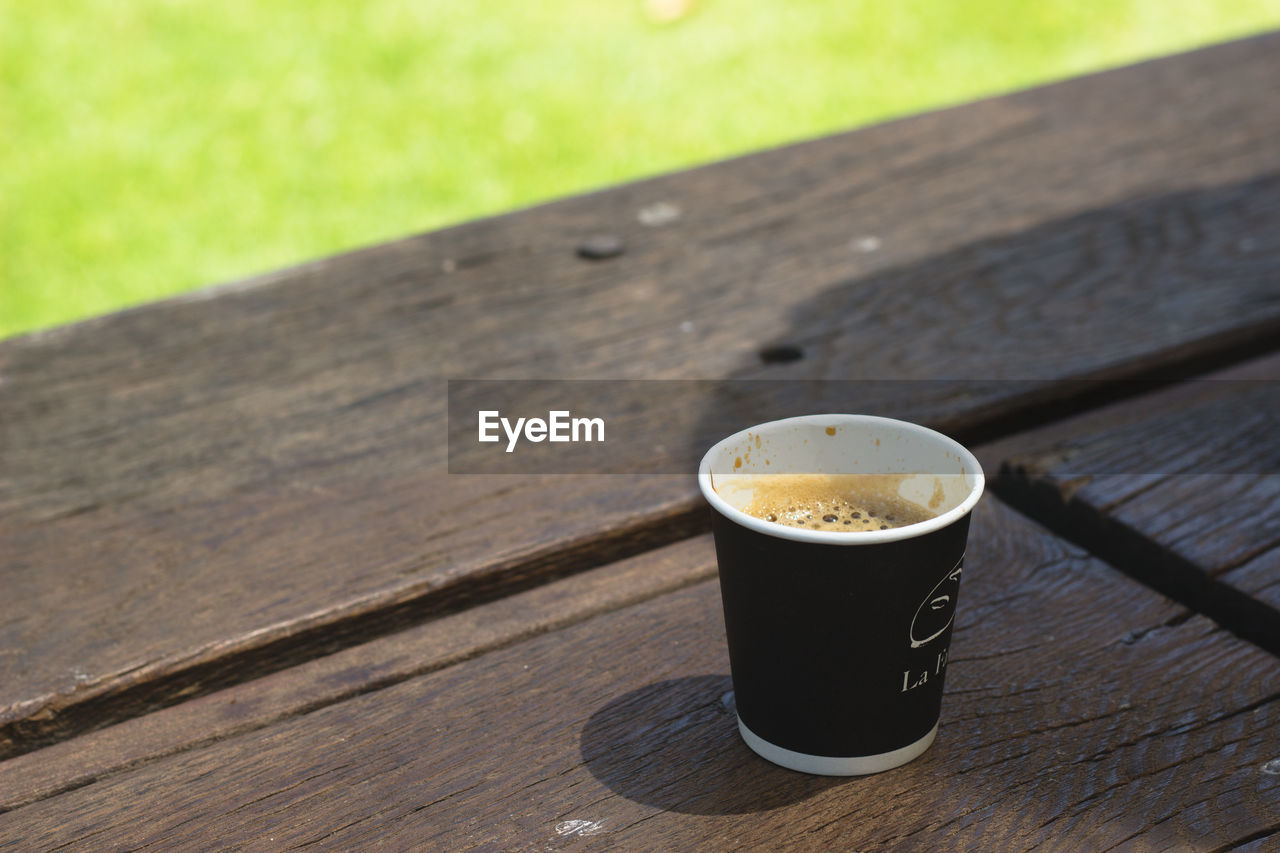 CLOSE-UP OF COFFEE ON TABLE