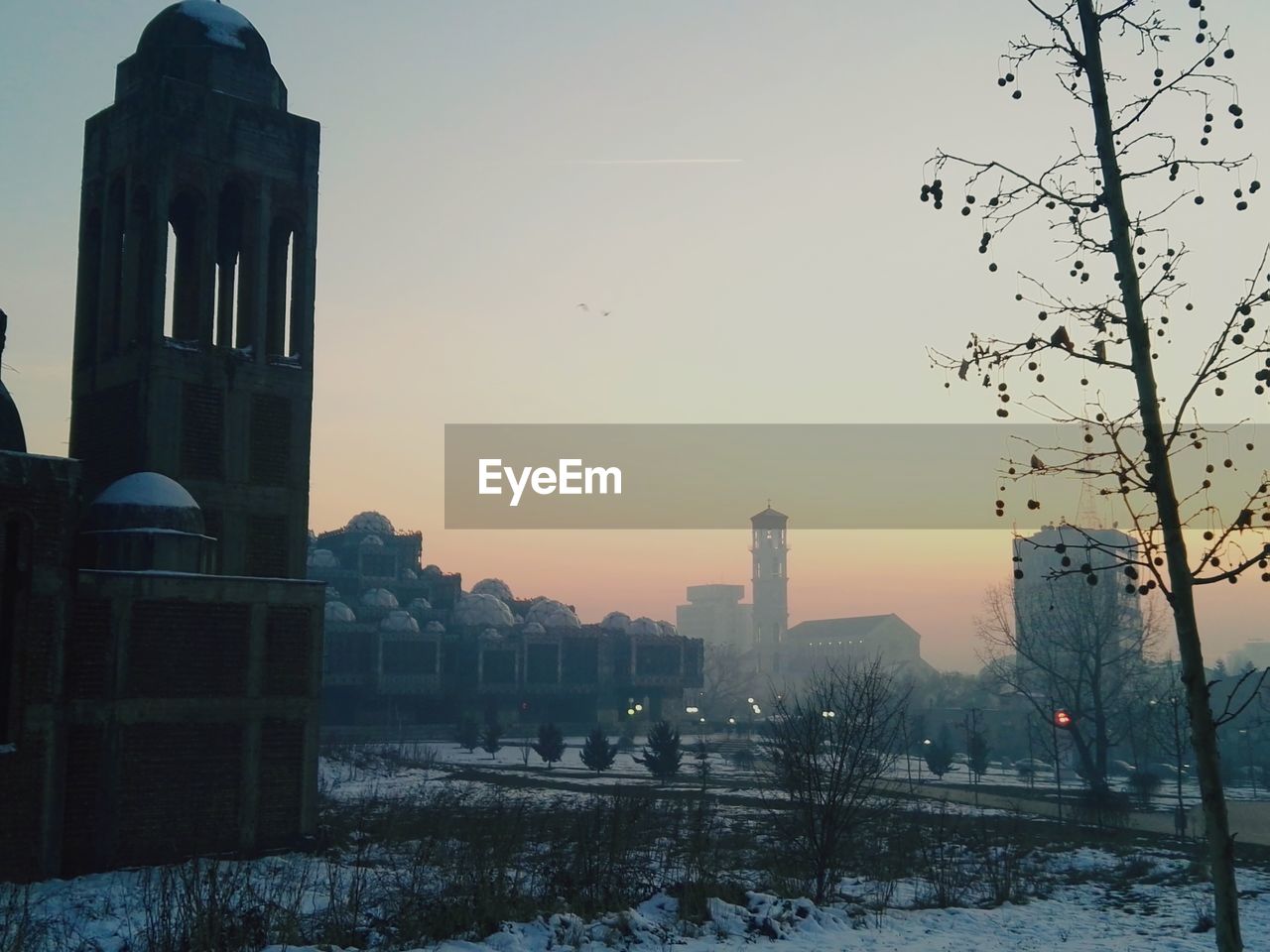 BUILDINGS IN CITY DURING SUNSET