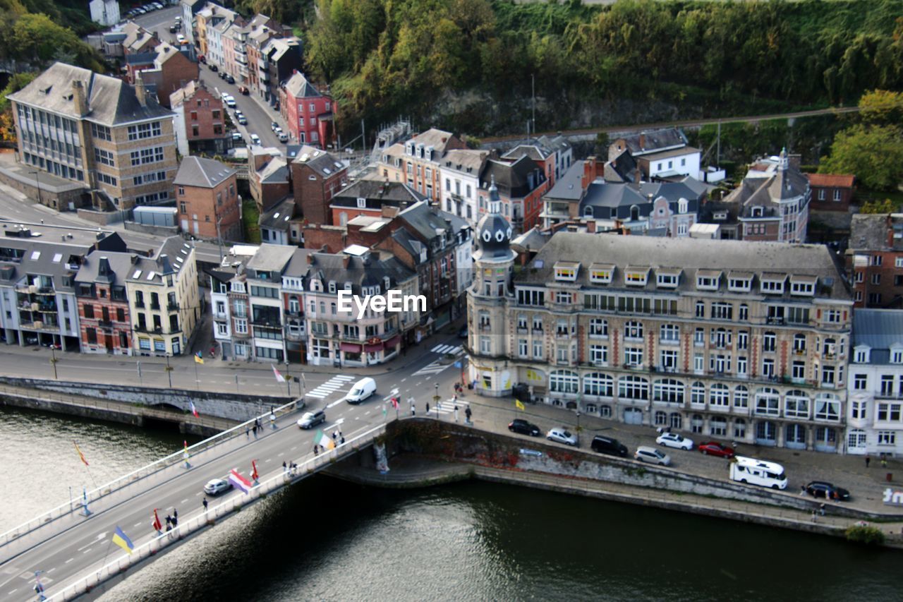 High angle view of buildings, bridge and river in city