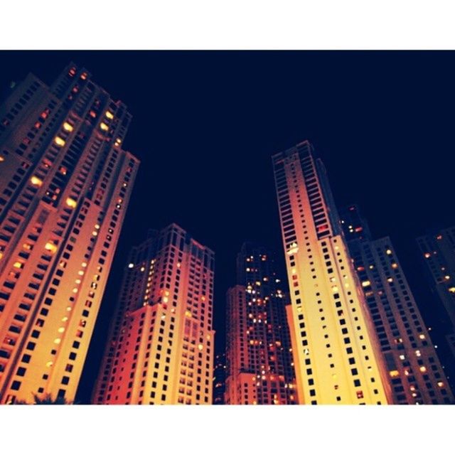 SKYSCRAPERS AT NIGHT