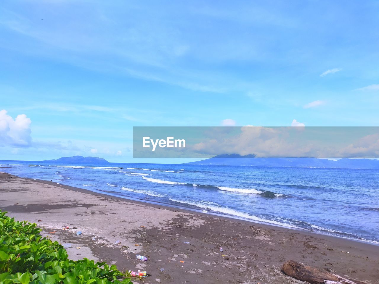 SCENIC VIEW OF SEA AGAINST BLUE SKY