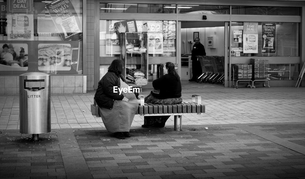 PEOPLE SITTING IN RESTAURANT AT STORE